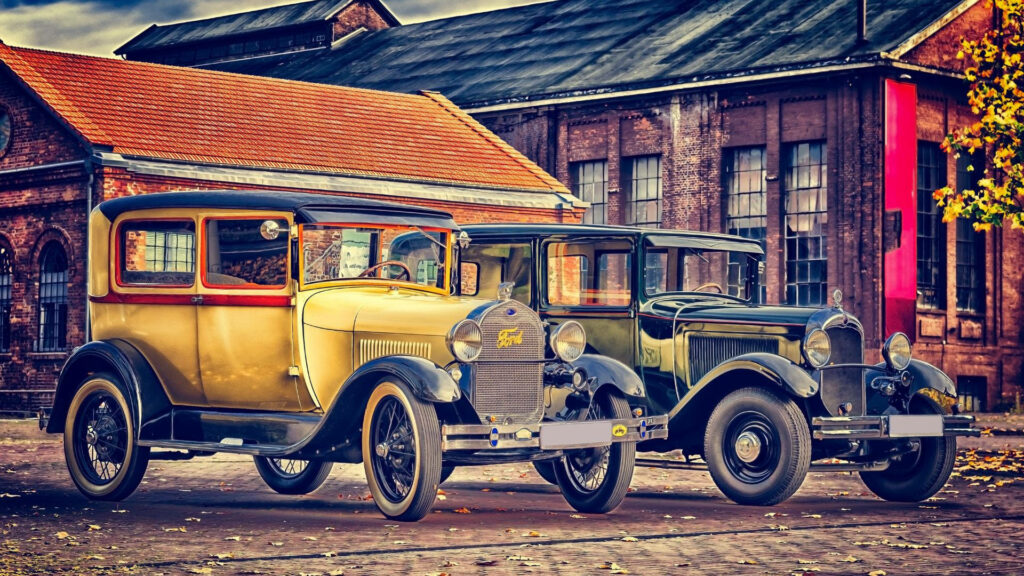 Vintage Wallpaper: Retro Cars & Classic Industrial Building Scene