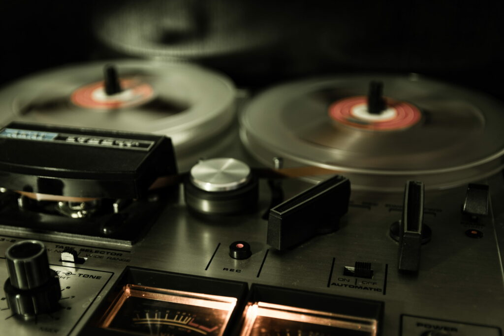 Studio Nostalgia: Vintage Reel to Reel Tape Recorder in Retro Tech HD Wallpaper Background Photo