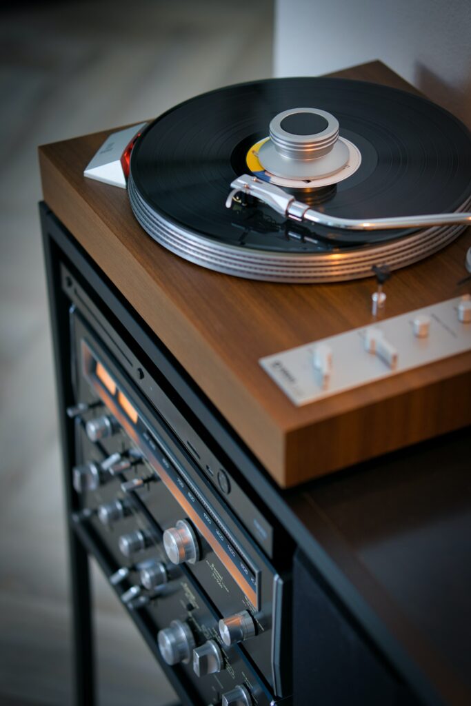 Vintage Turntable Wallpaper: Stylish Background with Spinning Vinyl