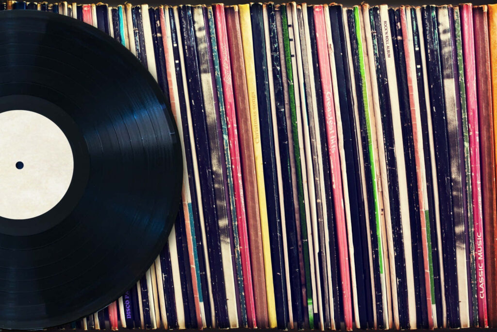 Nostalgic Vinyl Record Wallpaper with Retro Album Covers