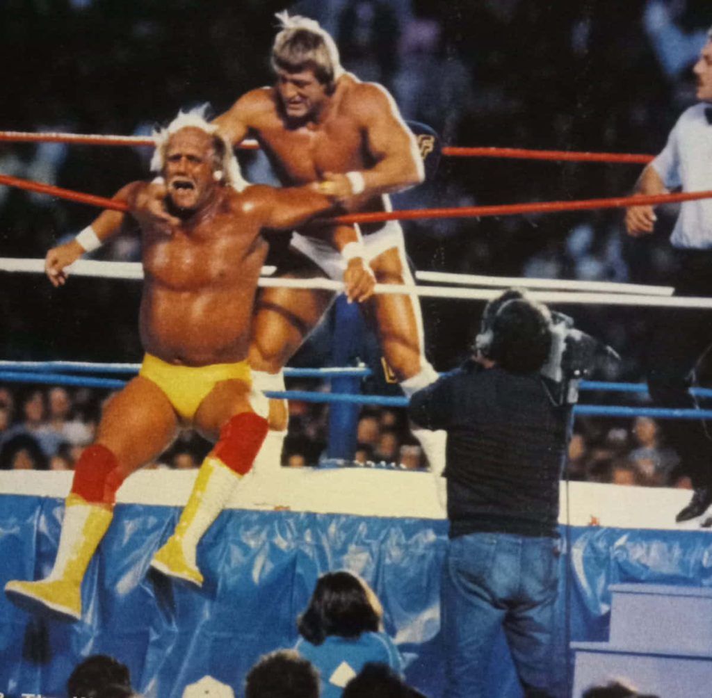 Vintage WWF wallpaper Hulk Hogan Paul Orndorff intense championship wrestling match ringside