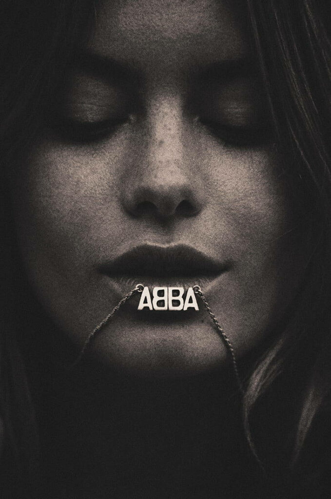 Vintage wallpaper close-up of woman holding ABBA necklace lips classic music style background
