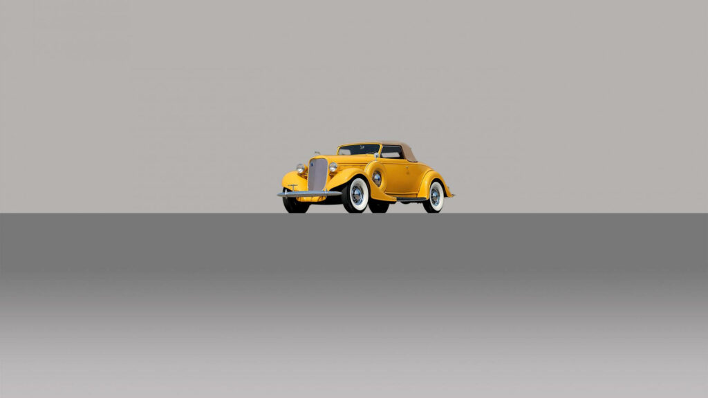 Vintage Yellow Car Wallpaper on Minimalist Gray Background