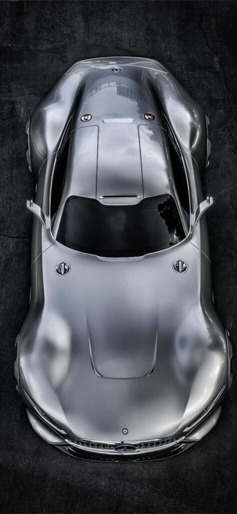 Top view of Vision Gran Turismo Mercedes AMG concept car with futuristic design and curves Wallpaper