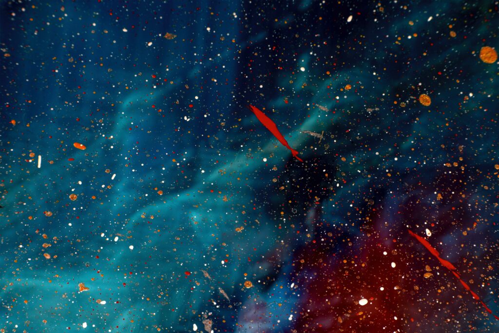 Vivid Abstract Wallpaper: Paint Splashes on Cosmic Background
