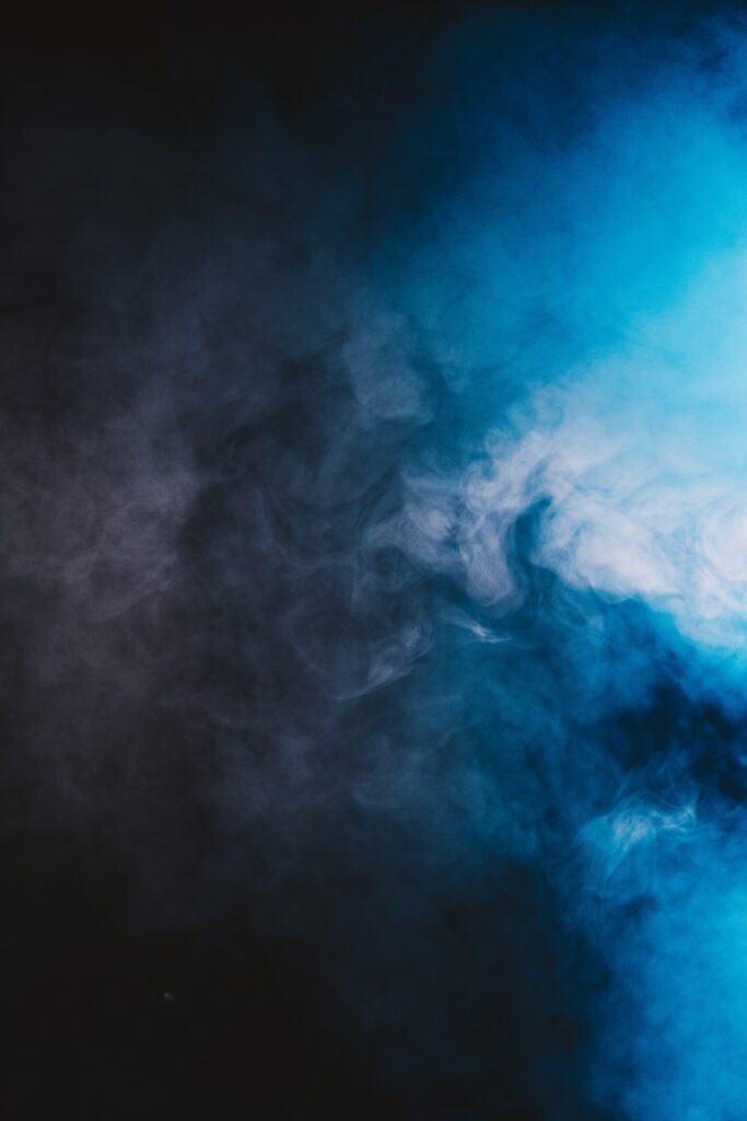 Mesmerizing 4000x6000 Blue Smoke Wallpaper on Dark Background
