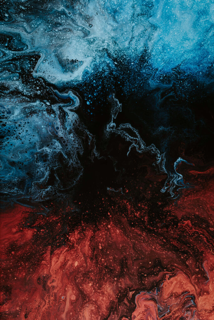 Vivid Abstract Wallpaper: Blue & Red Swirling Patterns on Black