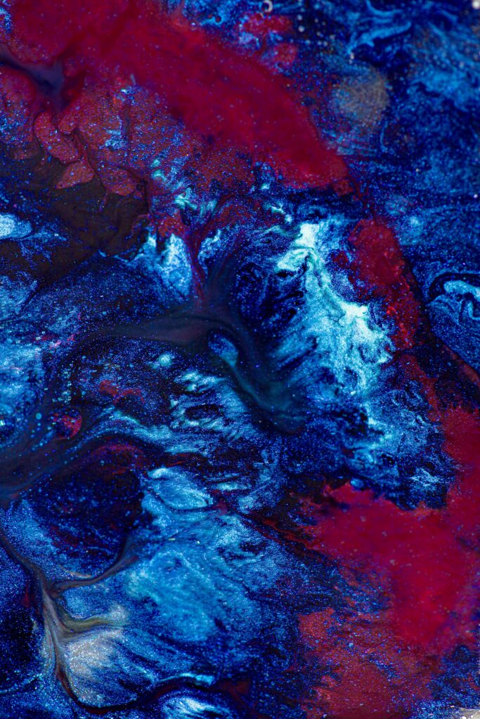 Dynamic Blue and Red Abstract Wallpaper with Marbled Texture