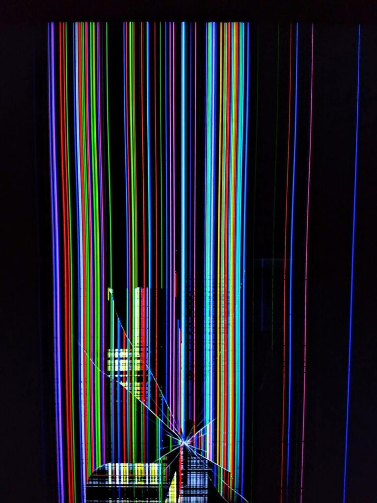 Vivid broken LCD screen wallpaper with colorful RGB vertical lines and abstract glitch effect