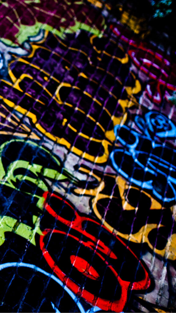 Vivid Graffiti Wallpaper: Bold Shapes & Urban Street Art Background