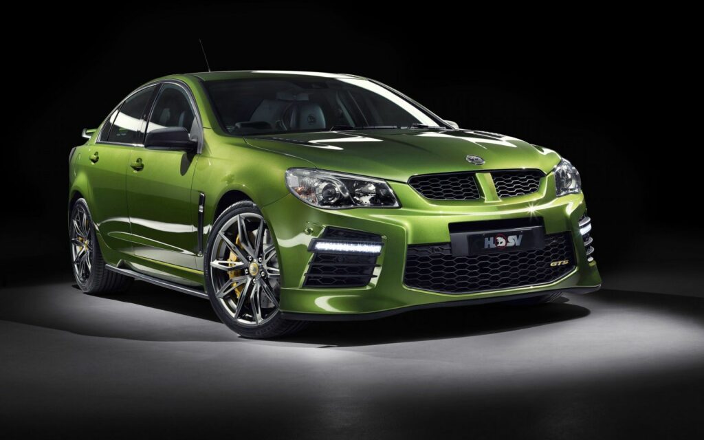Vivid Green Holden Commodore HSV Gen-F2: Sleek Side View Wallpaper