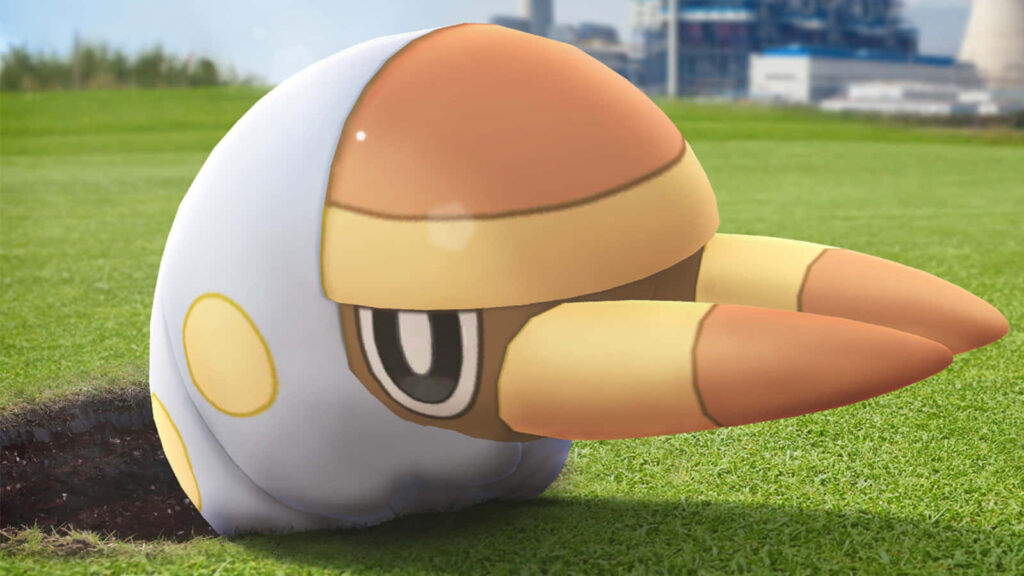 Vivid Grubbin Bug-Type Pokémon Wallpaper in a Lush Green Setting