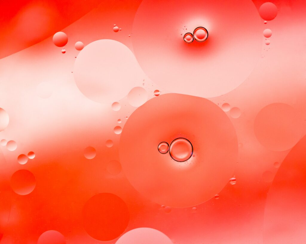 Vivid Macro Bubble Wallpaper: Mesmerizing Red & Orange Abstract Design
