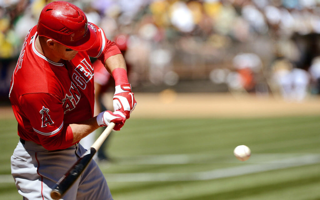 Vivid Mike Trout Wallpaper: Action Shot of Baseball's Best Hitter
