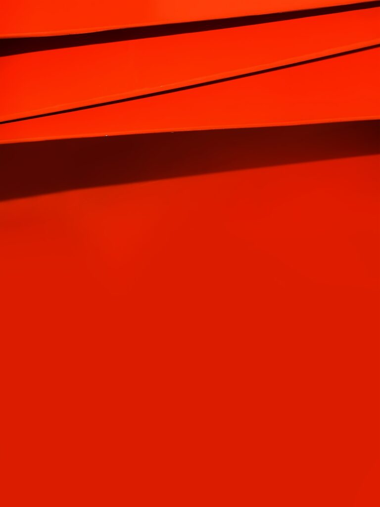 Vivid Orange Abstract Wallpaper with Dynamic Shadows - High Res Background