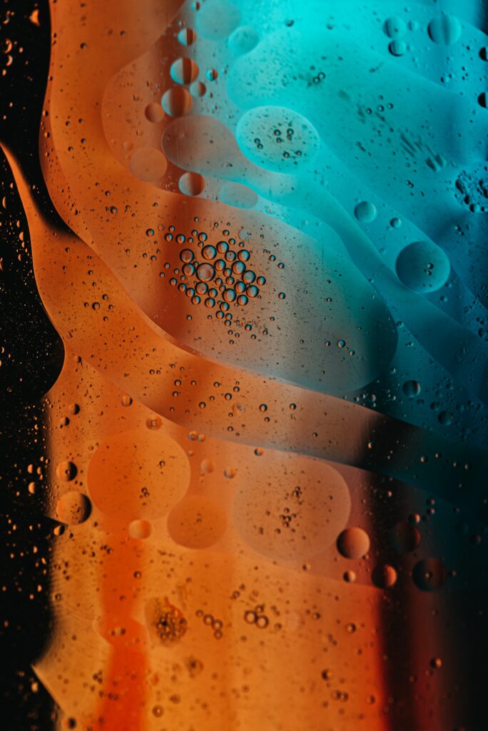 Mesmerizing Orange and Blue Abstract Wallpaper with Bubbles