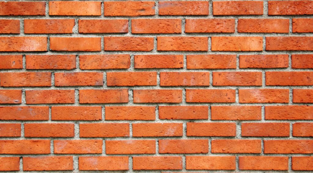 Vivid Orange Brick Texture Wallpaper Background - Rustic Charm
