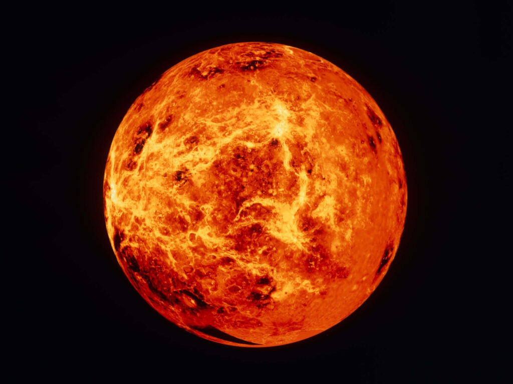 Glowing Orange Sphere Wallpaper: Fiery Planet on Black Background