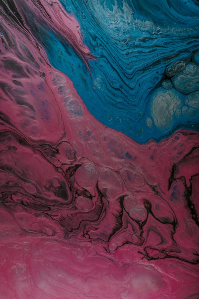 Vivid Abstract Wallpaper: Flowing Pink & Blue Paint Design