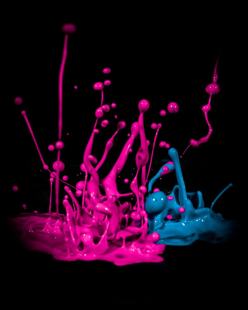 Vivid Pink & Blue Paint Splashes: Dynamic Macro Wall Art Wallpaper