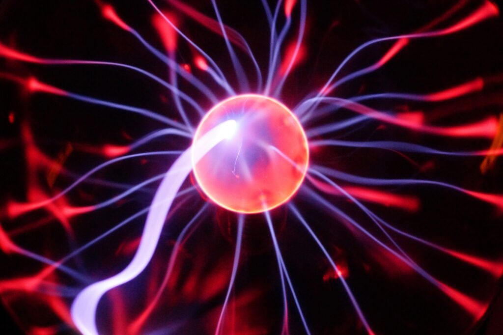 Vivid Plasma Orbs Abstract Wallpaper with Radiant Light Tendrils