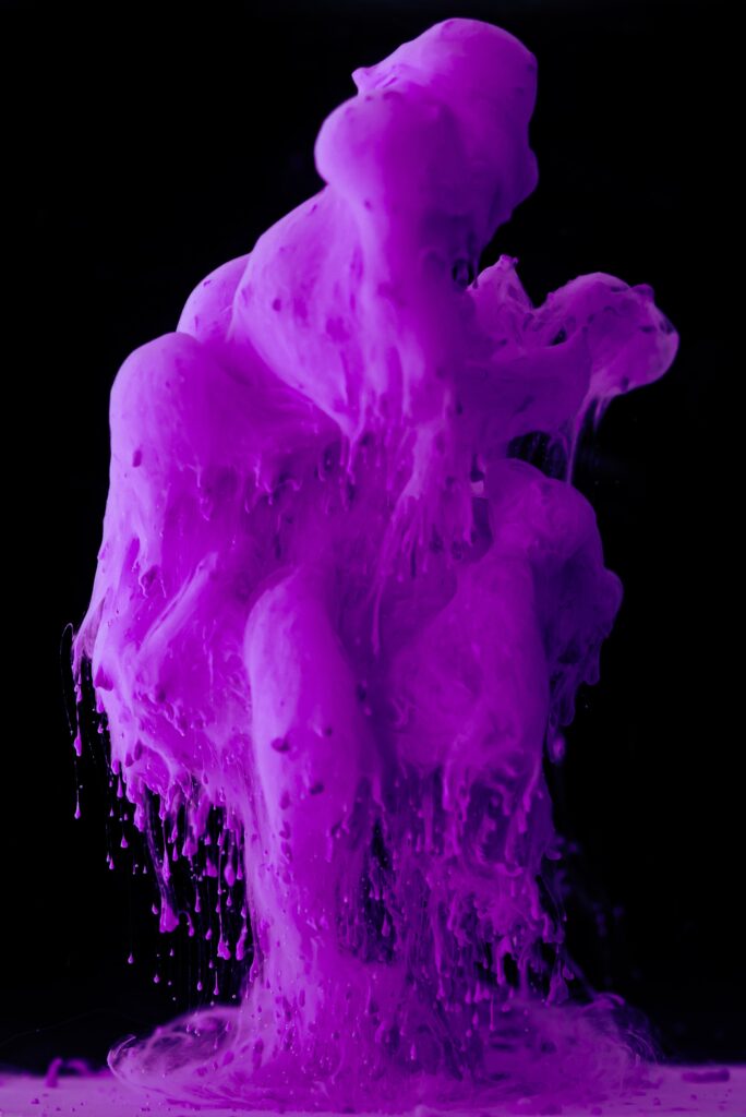 Vivid Purple Splash Art on Black Background - Stunning Abstract Display Wallpaper