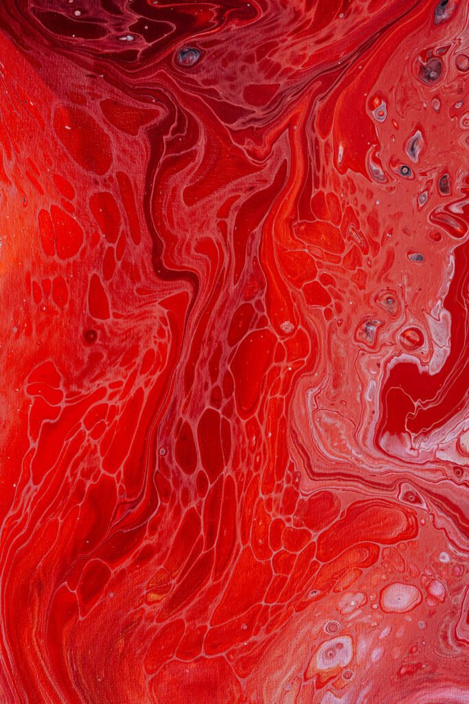 Vivid Red Abstract Wallpaper: Fluid Paint Texture & Bold Patterns