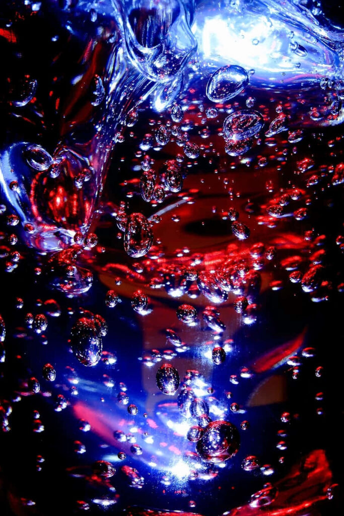 Vivid Abstract Wallpaper: Red and Blue Hues with Water Bubbles