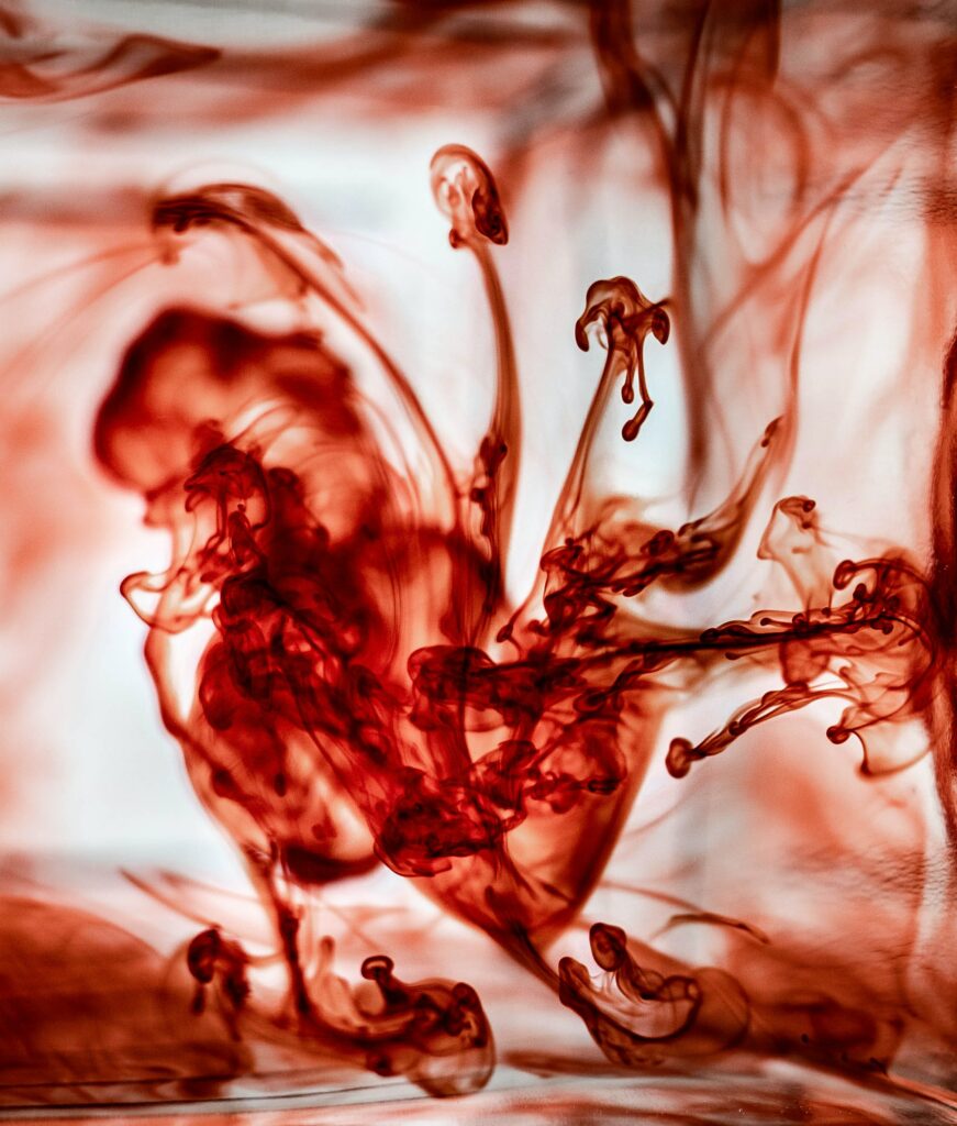 Vivid Red Ink Diffusion Abstract Wallpaper: Stunning Floral Patterns