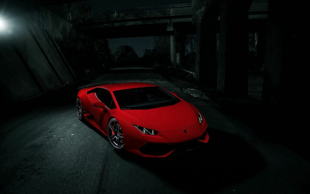 Vivid Red Lamborghini Huracan LP610-4 Wallpaper on Dark Background