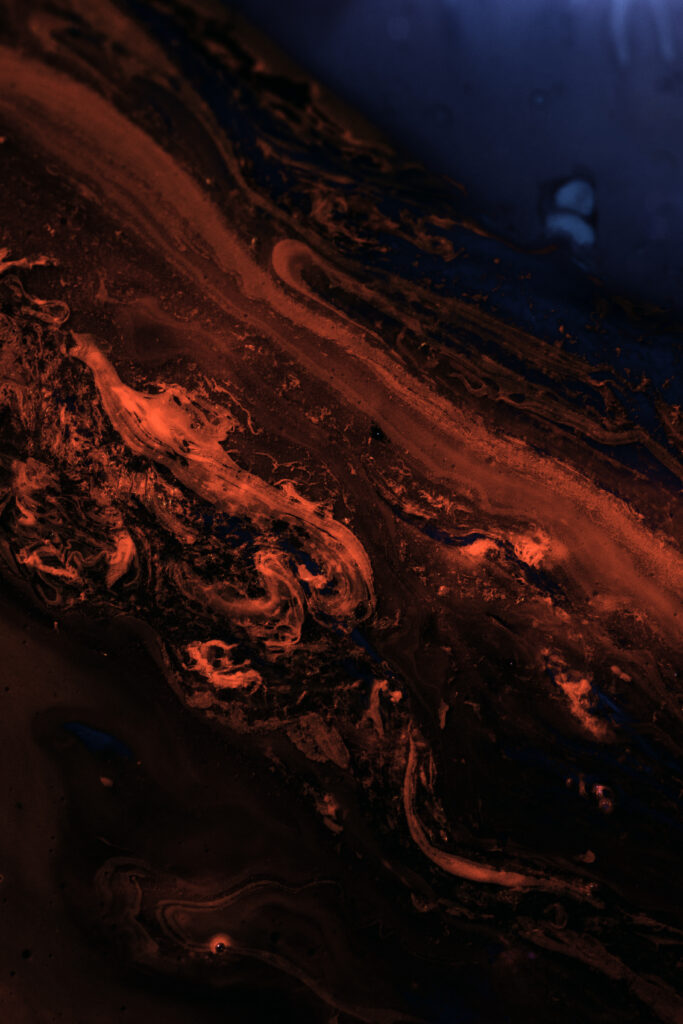 Vivid Red Liquid Patterns on Dark Background - Abstract Wallpaper