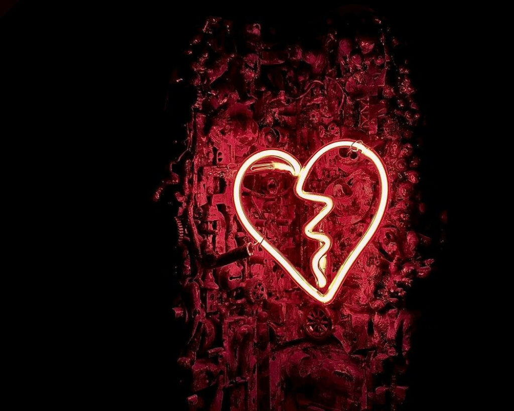 Moody Red Neon Broken Heart Wallpaper Background Design
