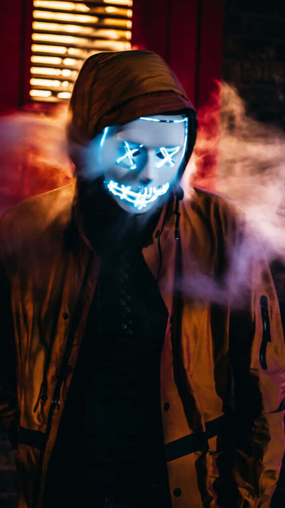 Vivid Samsung AMOLED Wallpaper: Mysterious Figure in Glowing Mask