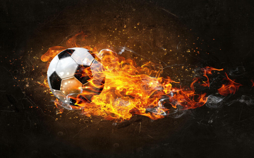 Fiery Soccer Ball Wallpaper: Ignite Your Desktop with Intense Visuals