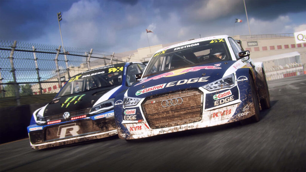 Volkswagen and Audi dirt rally cars racing on muddy track intense competitive motorsport action Wallpaper