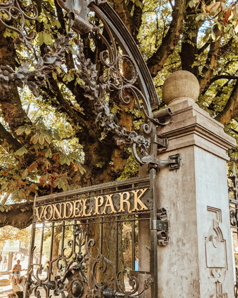 Charming Vondel Park Gate Wallpaper: Lush Greenery & Ironwork