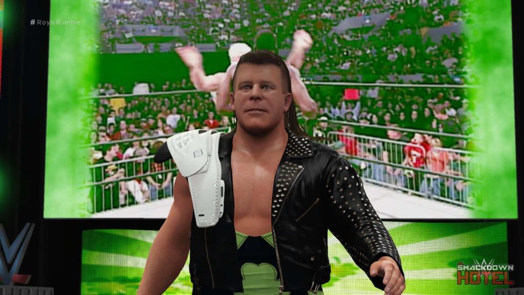 WWE 2K16 British Bulldog CGI wallpaper with studded jacket in vibrant Royal Rumble arena background
