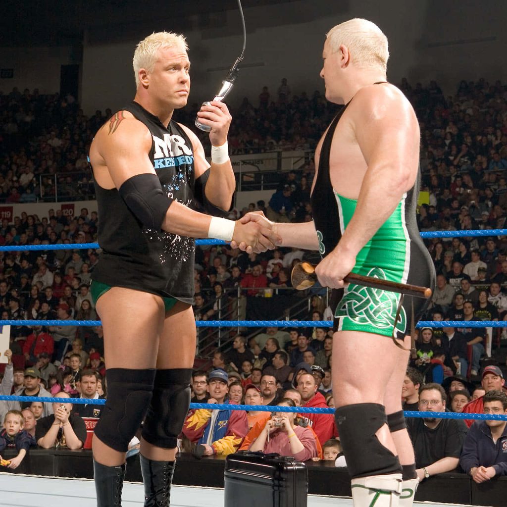 WWE SmackDown wallpaper Mr Kennedy microphone Fit Finlay shillelagh handshake in blue ring
