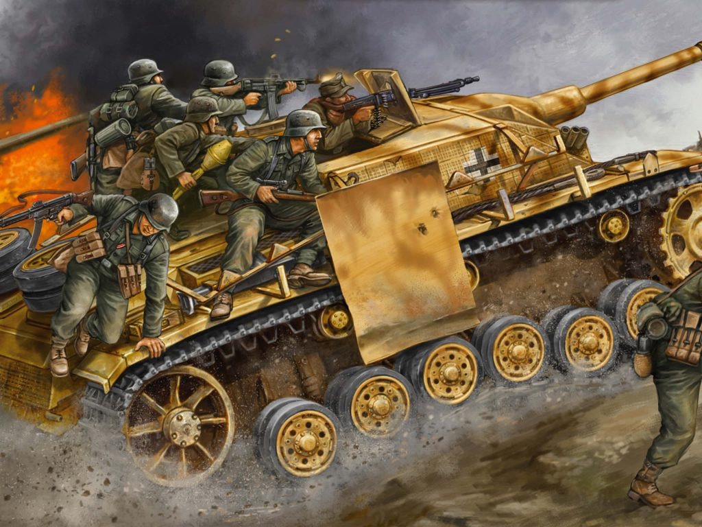 WWII StuG III tank advancing through mud with Wehrmacht infantry and combat fire background Wallpaper