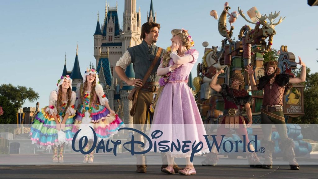 Tangled characters Rapunzel Flynn Rider with Snuggly Ducklings near Cinderella Castle Disney World Wallpaper