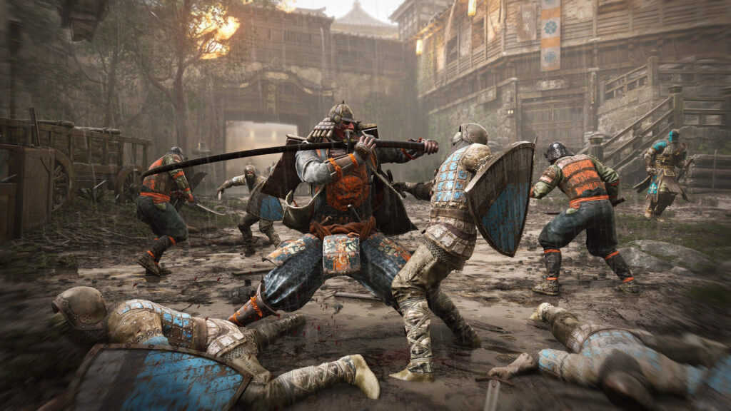 Warriors Defending Honor Amidst a Battle-Scarred Battleground Wallpaper