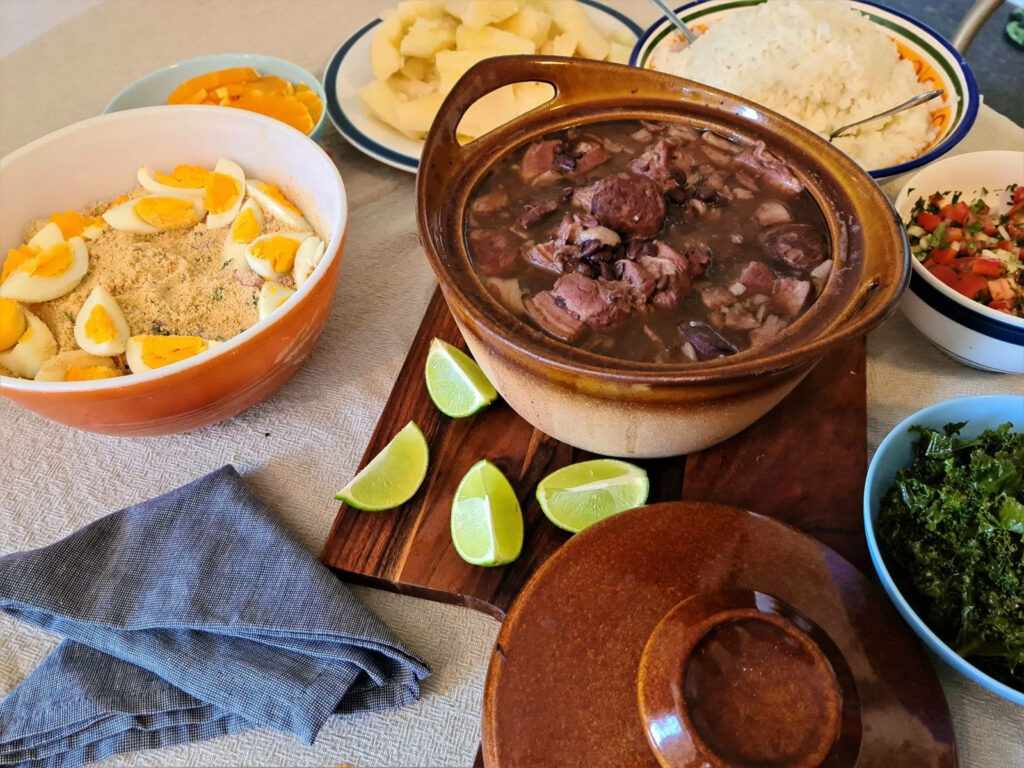 Vibrant Brazilian Feijoada Wallpaper: Heartwarming Meal Scene