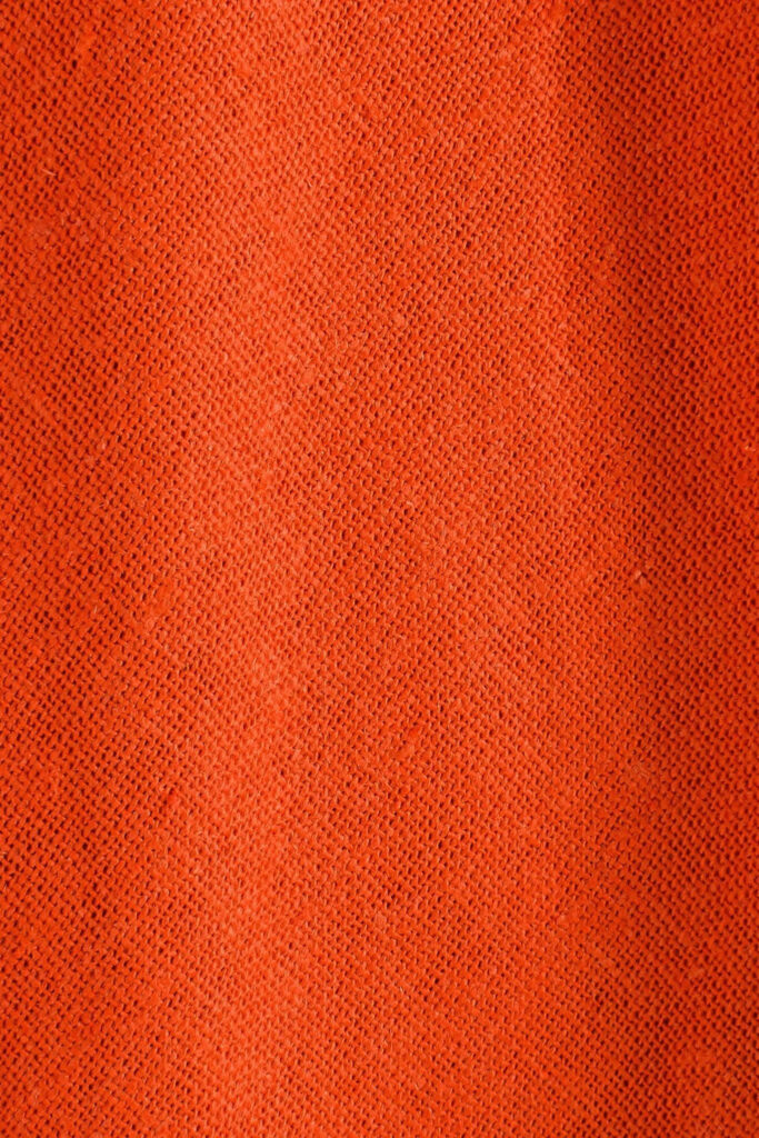Burnt Orange Textured Wallpaper: Warm Earthy Background Design