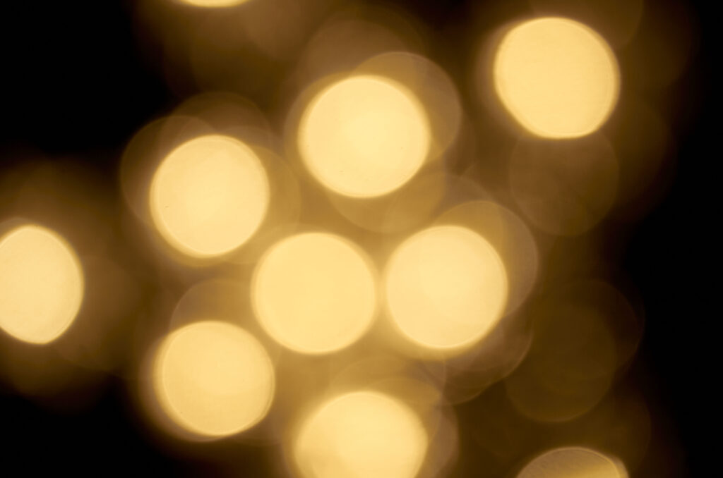 Warm Golden Bokeh Wallpaper: Dreamy Abstract Background Design