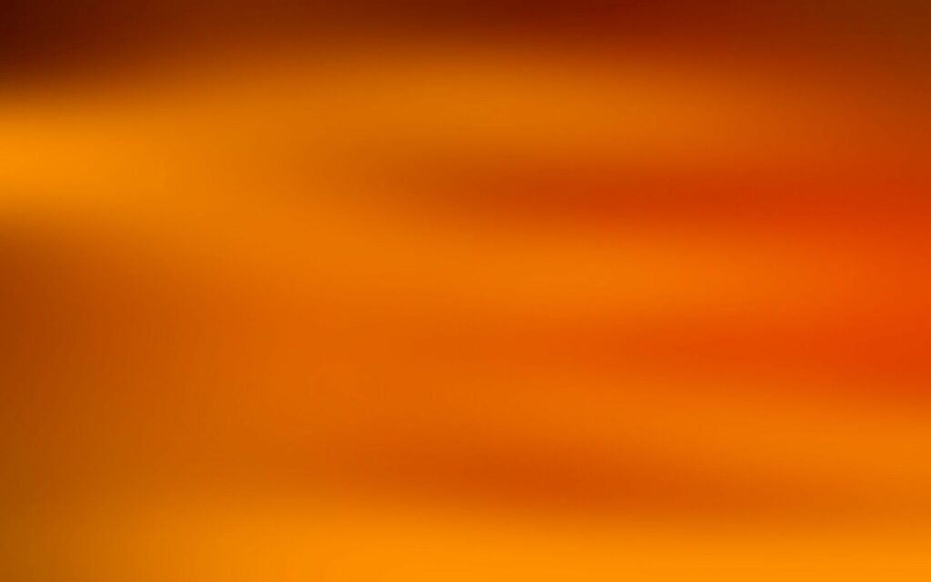 Warm Orange Gradient Wallpaper with Soft, Textured Design