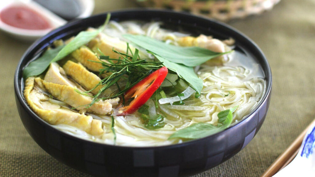 Warm Vietnamese Pho: Tender Chicken, Rice Noodles & Fresh Herbs Wallpaper