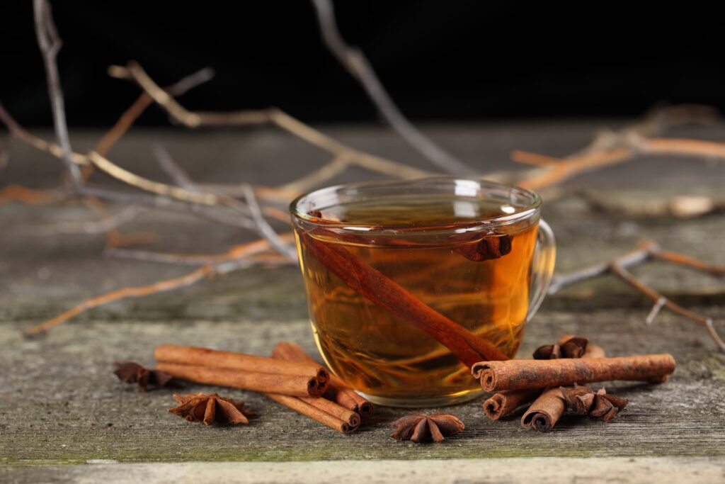 Warm Tea & Spices Wallpaper: Cozy Cinnamon & Star Anise Scene