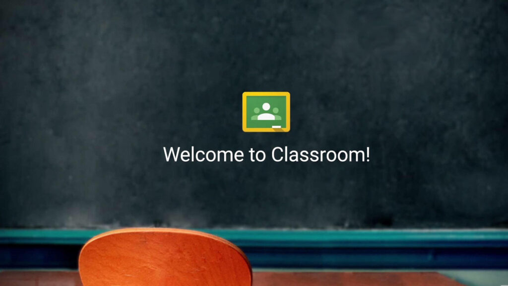 Chalkboard wallpaper with warm welcome message for Google Classroom and wooden chair view