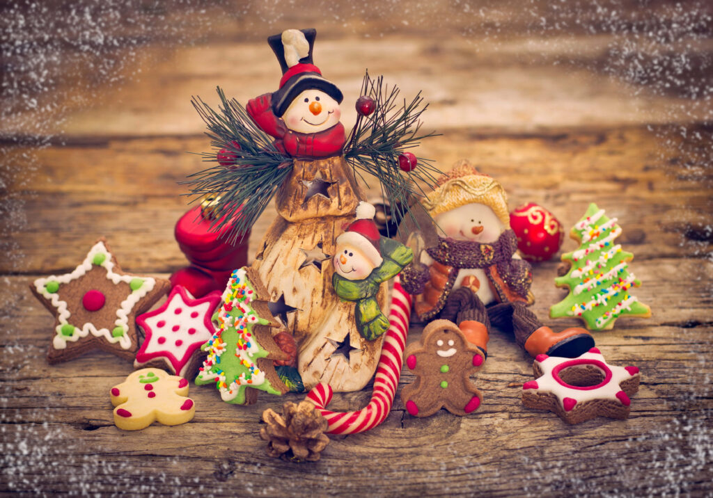 Festive Delight: A Captivating Christmas Scene with Sparkling Tree and Cozy Fireplace Wallpaper