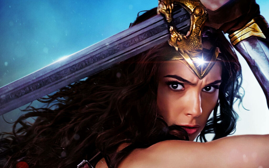 Invisible Guardian: Wonder Woman Wielding Her Sword in Close Proximity Wallpaper